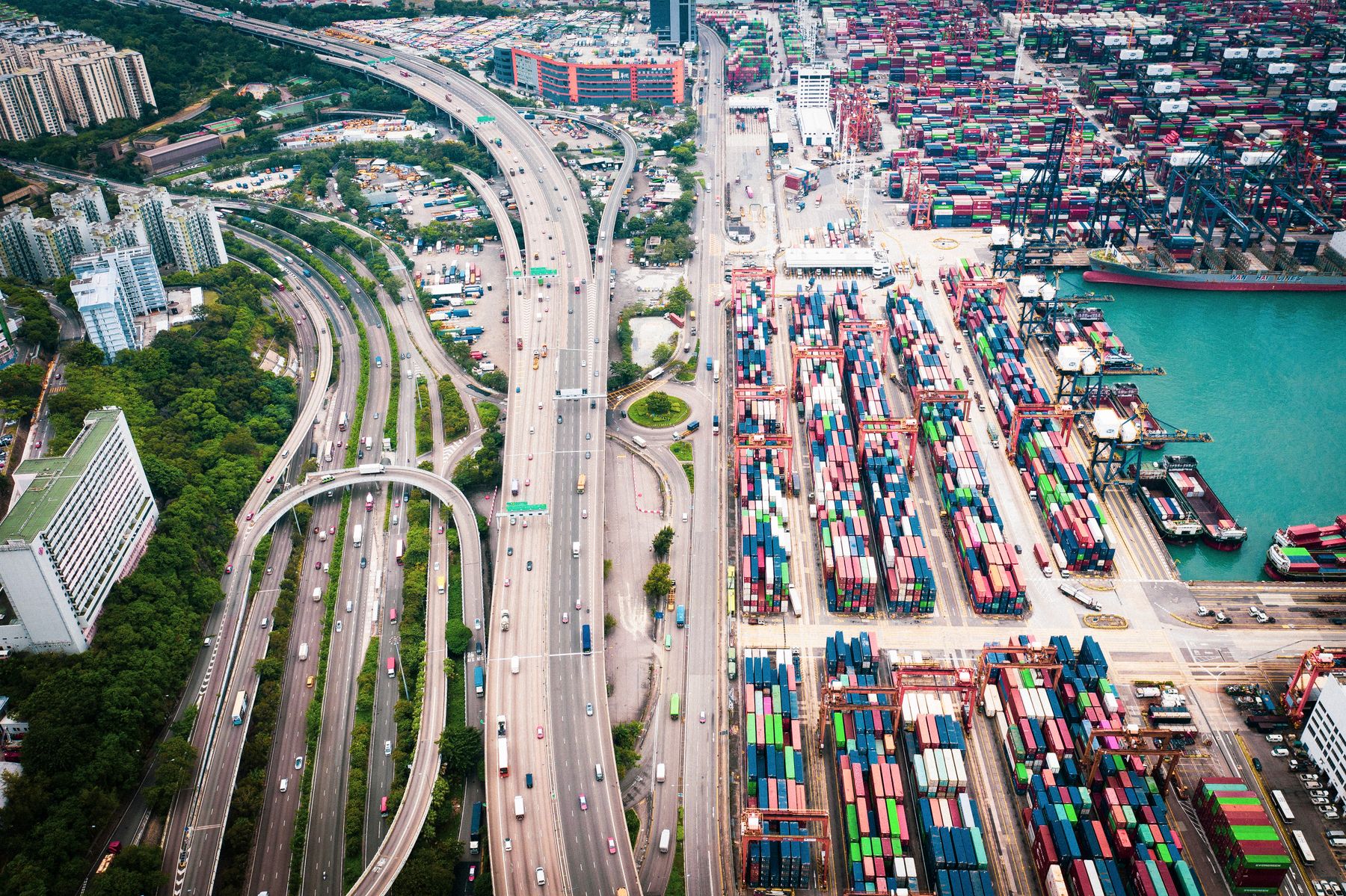 Aerial view of roads, container yards and berths in Hong Kong